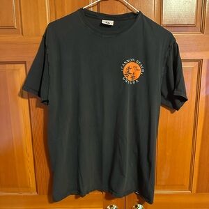 Graphic Tee- Cannon Beach, OR, Size L. Black tee and orange design